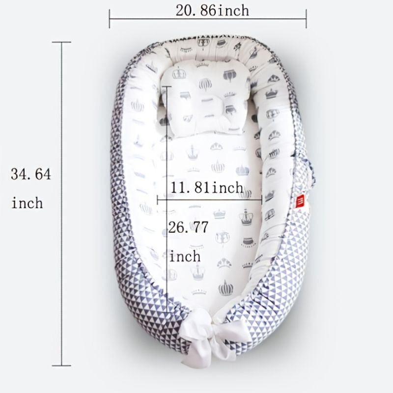 Réducteur de lit bébé