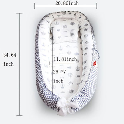 Réducteur de lit bébé