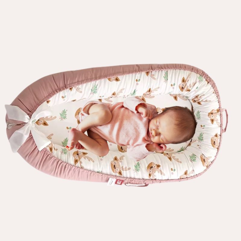 Réducteur de lit bébé